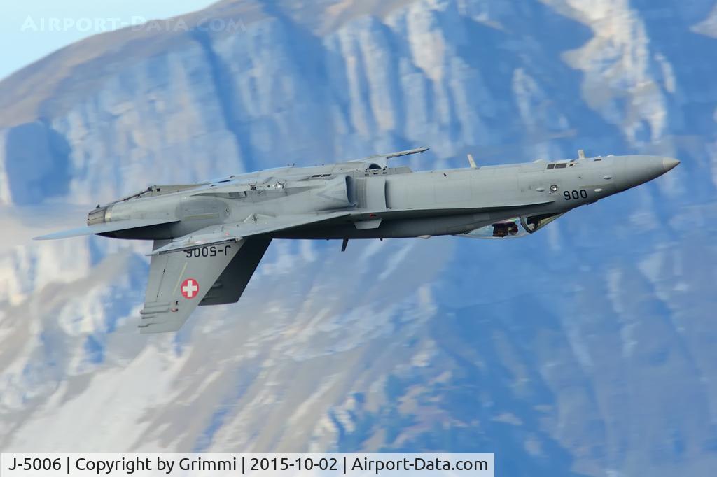 J-5006, McDonnell Douglas F/A-18C Hornet C/N 1329, Captain Julien 'Teddy' Meister upside down over the shooting range - Swiss Hornet Display Team