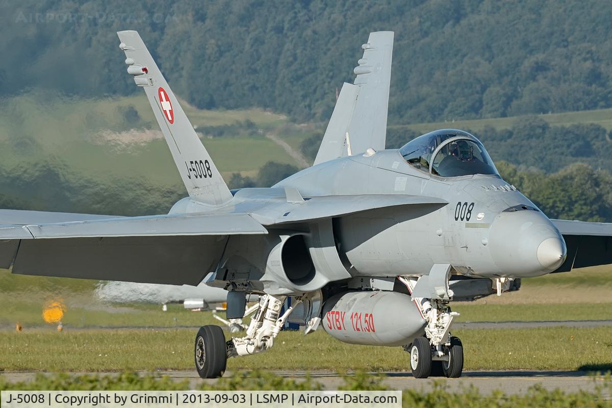 J-5008, McDonnell Douglas F/A-18C Hornet C/N 1336/SFC008, Returning from a mission with J-5023 just vacating the runway in the background. Note the very big Spoilers/Flaps seen from this angle.