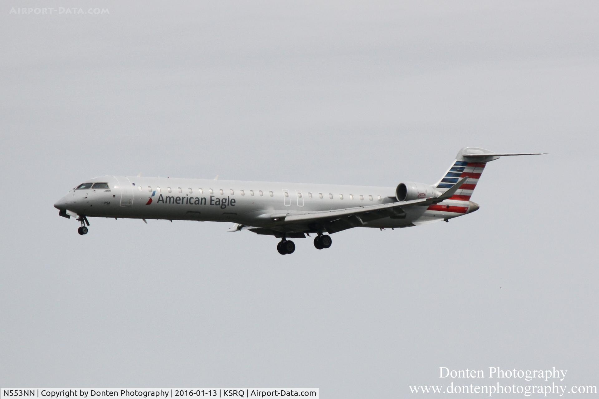 N553NN, 2014 Bombardier CRJ-900 NG (CL-600-2D24) C/N 15333, American Flight 5403 operated by PSA (N553NN) arrives at Sarasota-Bradenton International Airport following flight from Charlotte-Douglas International Airport
