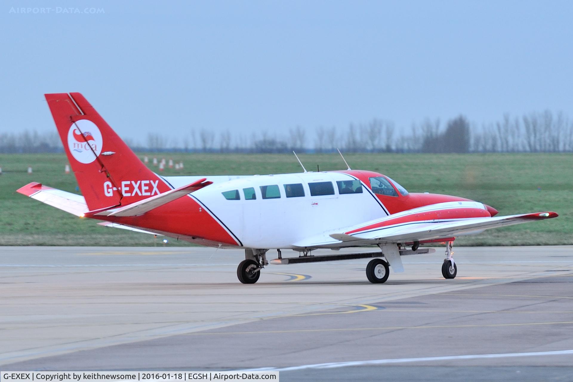 G-EXEX, 1977 Cessna 404 Titan C/N 404-0037, Leaving Norwich.