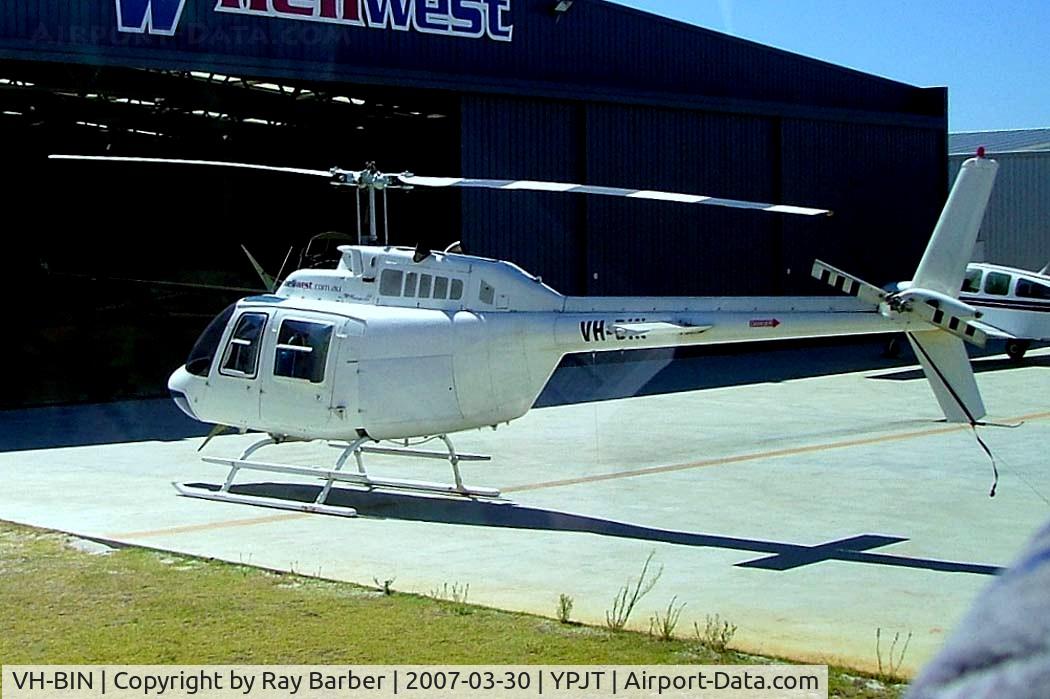 VH-BIN, 1976 Bell 206B JetRanger II C/N 2019, Bell 206B-2 Jet Ranger II [2019] (Heliwest) Perth-Jandakot~VH 30/03/2007. Taken through the glass of the coach.