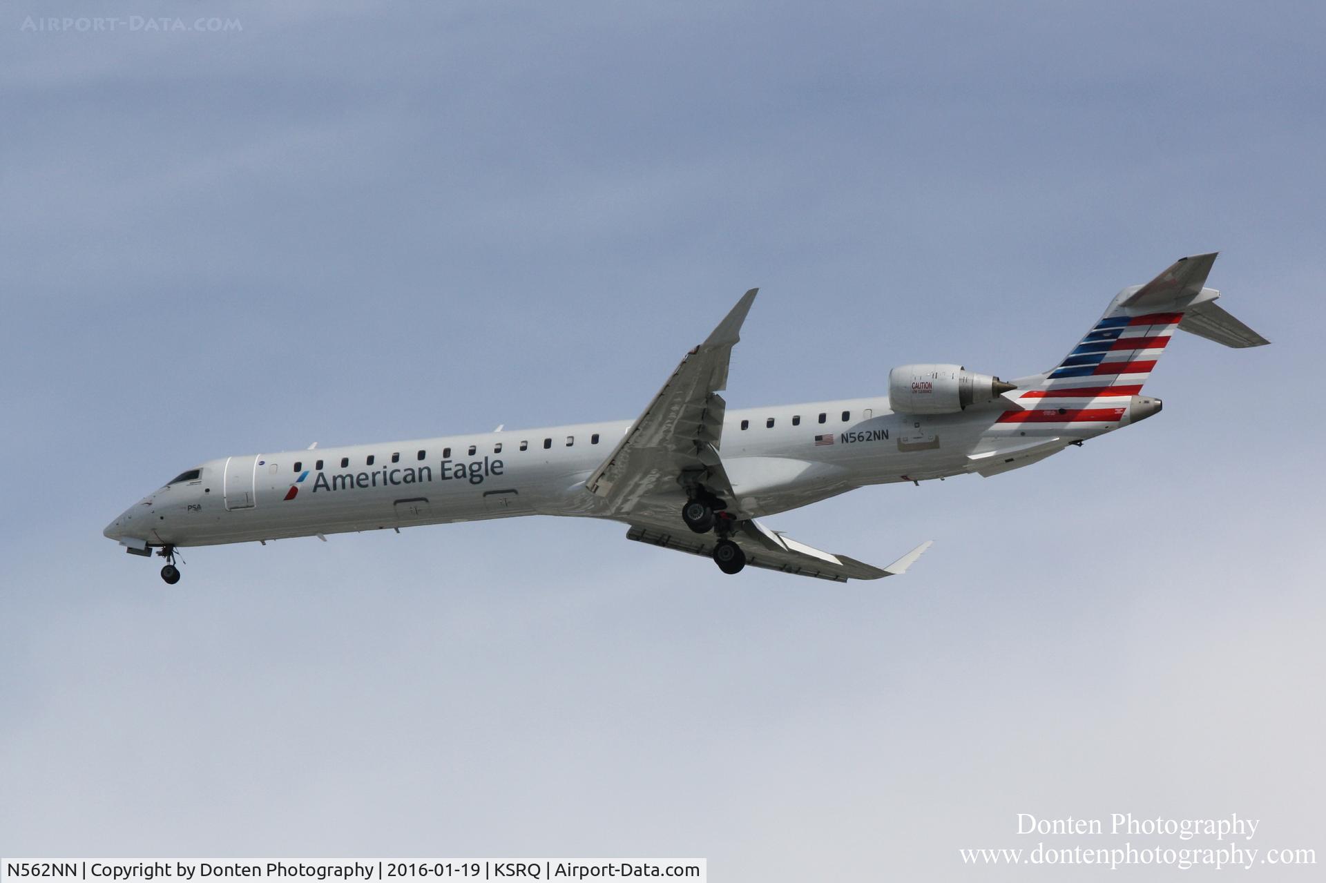 N562NN, 2014 Bombardier CRJ-900 (CL-600-2D24) C/N 15347, American Flight 5139 operated by PSA (N562NN) arrives at Sarasota-Bradenton International Airport following flight from Charlotte-Douglas International Airport