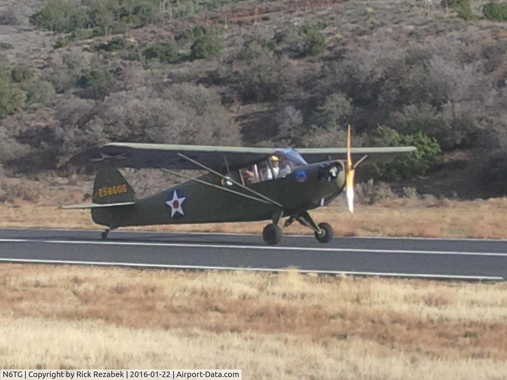 N6TG, 1942 Taylorcraft DC-65 C/N 6045, Warbug taxiing in after landing.