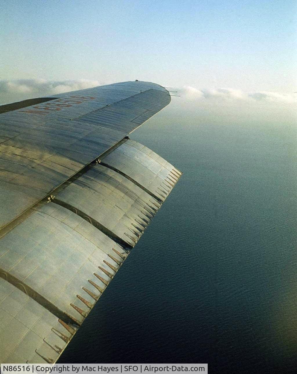 N86516, 1946 Lockheed L-049-46 Constellation C/N 2043, 1959, over San Francisco Bay