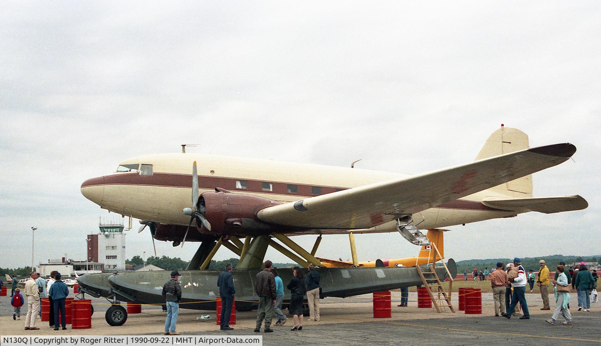 N130Q, 1943 Douglas DC-3-G202A Skytrooper C/N 11761, A photo of N130Q taken at Manchester, NH on 22 September 1990. Part of my Flickr album with more photos.