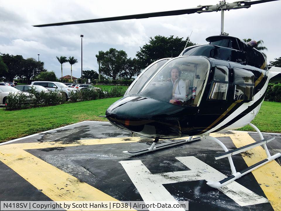 N418SV, 1978 Bell 206B C/N 2399, Pulling collective.