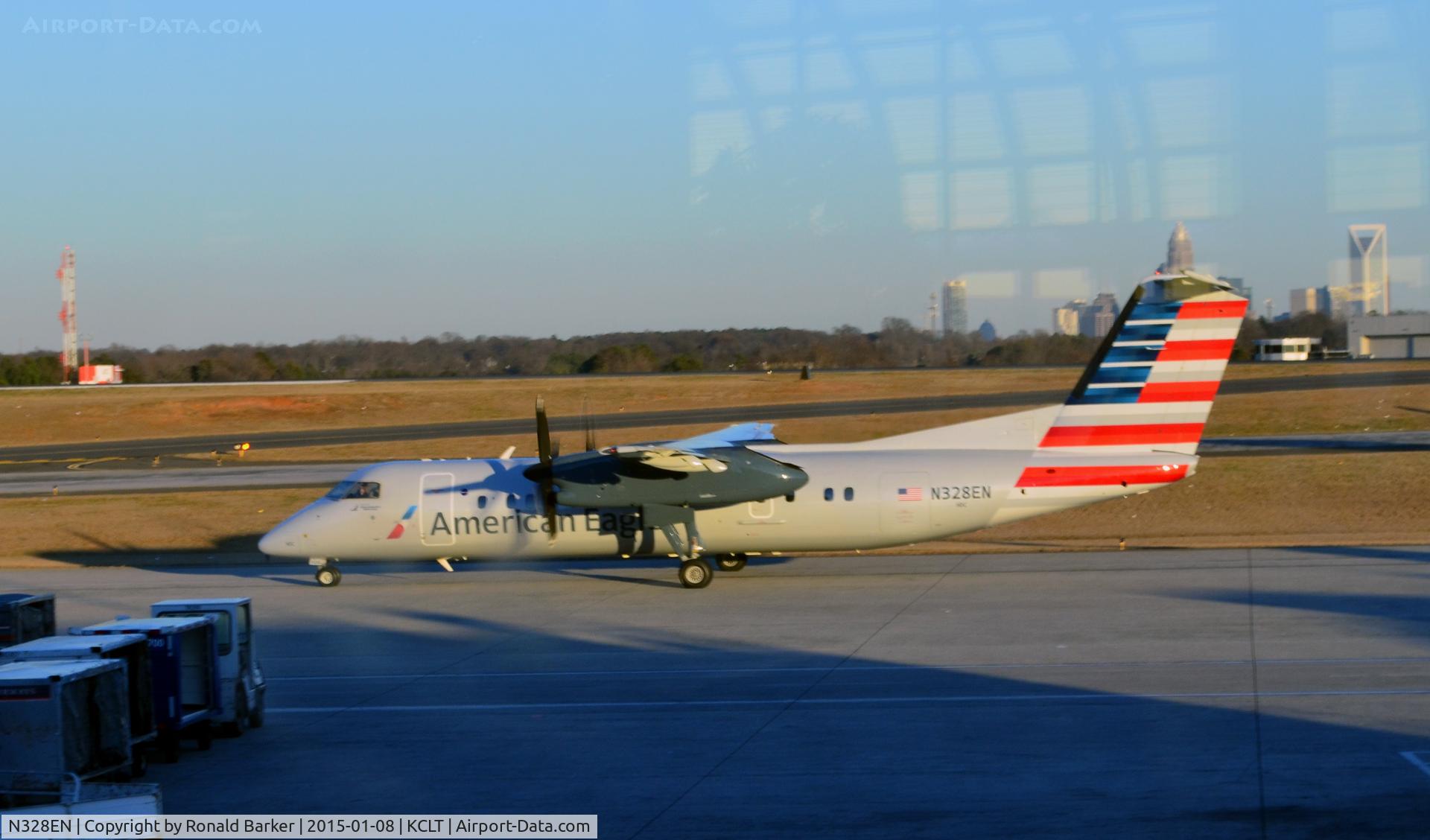 N328EN, 1991 De Havilland Canada DHC-8-311 Dash 8 C/N 281, Taxi to park CLT