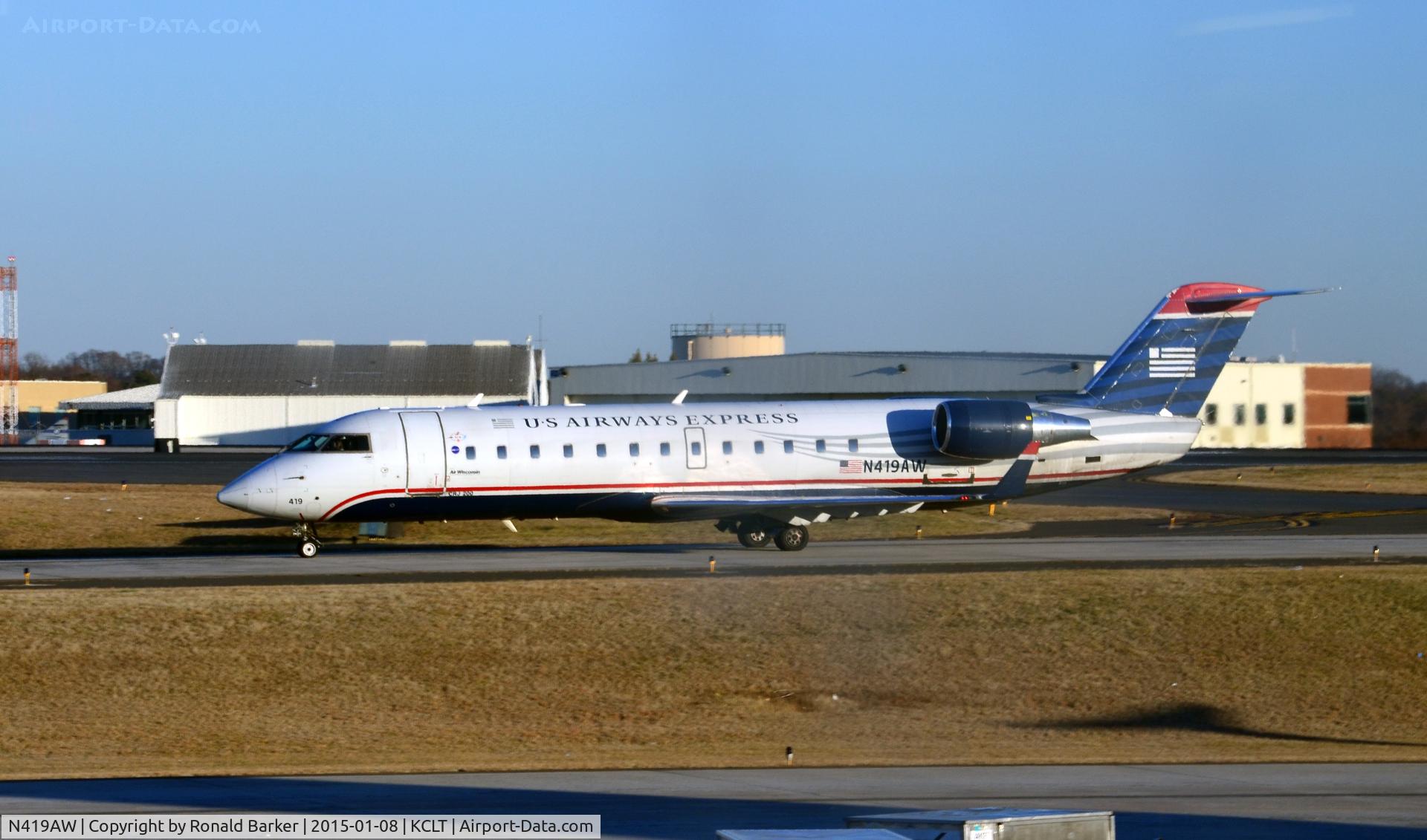 N419AW, 2002 Bombardier CRJ-200LR (CL-600-2B19) C/N 7633, Taxi to park CLT