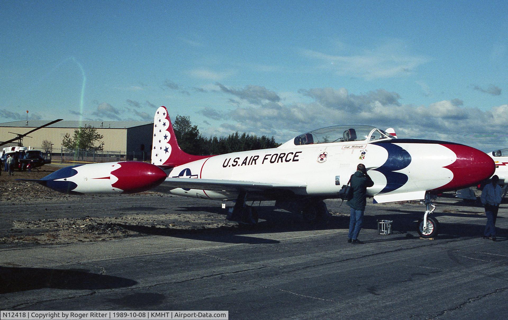 N12418, Canadair T-33AN Silver Star 3 C/N T33-265, T-33 in Thunderbirds colors.  More photos on my Flickr page at the link.