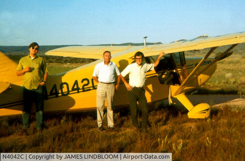 N4042C, 1950 Stinson 108-3 Voyager C/N 108-5042, Taken near Prescott, Arizona on an archery deer hunt in approximately 1972.  Archers were from the Yuma Proving Grounds and IBM in Yuma.