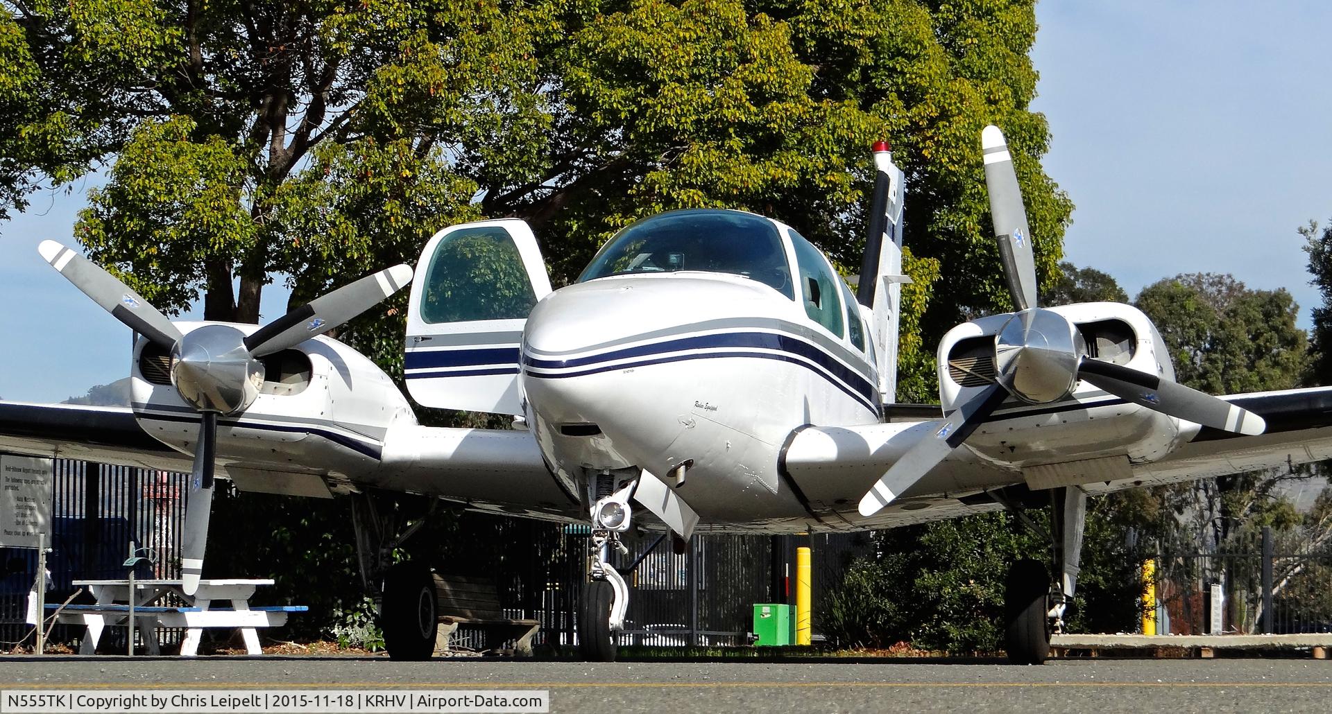 N555TK, 1976 Beech 95-B55 (T42A) Baron C/N TC-2001, Locally-based 1976 Beechcraft Baron 55 parked at the wash rack prior to flight to nearby Hayward Exec at Reid Hillview Airport, San Jose, CA. This is my favorite airplane on the field.