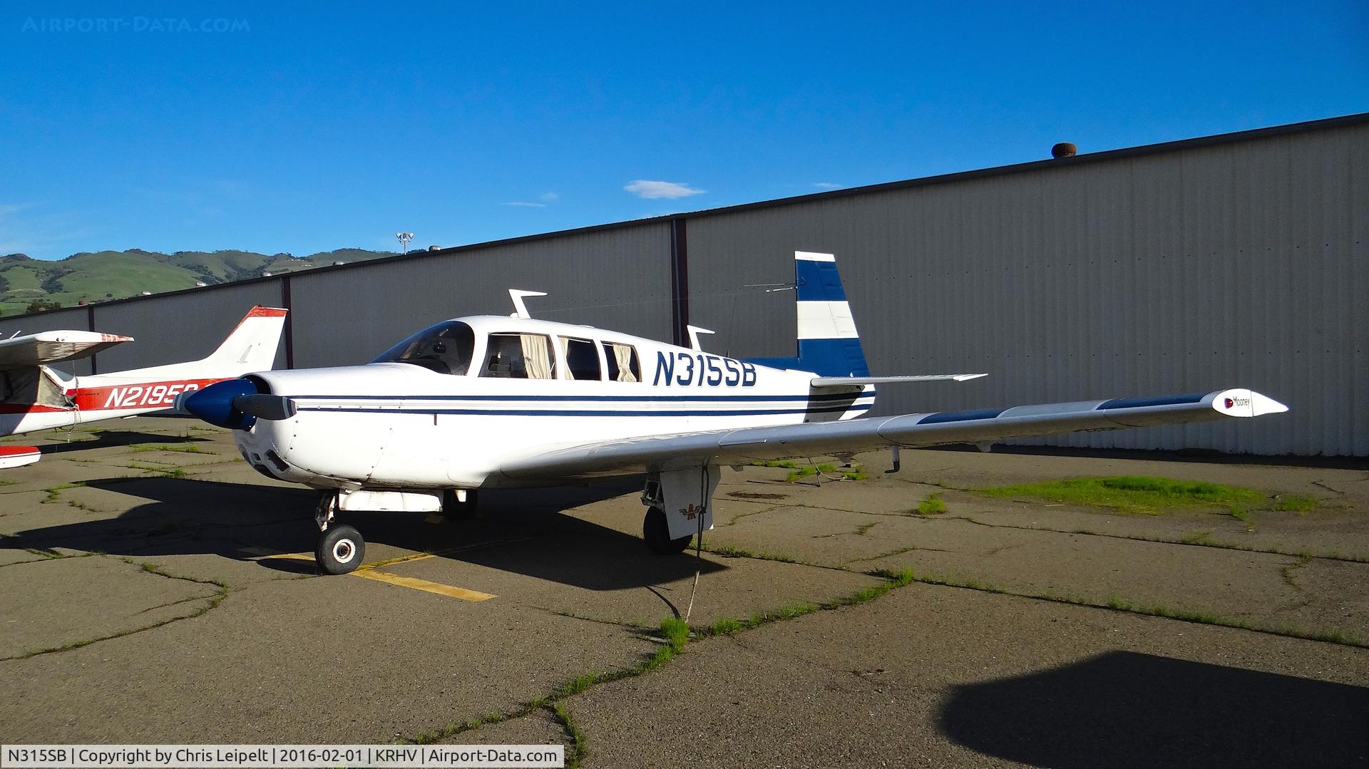 N315SB, 1969 Mooney M20F Executive C/N 700005, Locally-based 1969 Mooney M20F looking better than ever (no more cob-web flat tires!) parked at a temporary tie down to make room for all the transient Super Bowl 50 aircraft coming to Reid Hillview Airport, San Jose, CA.