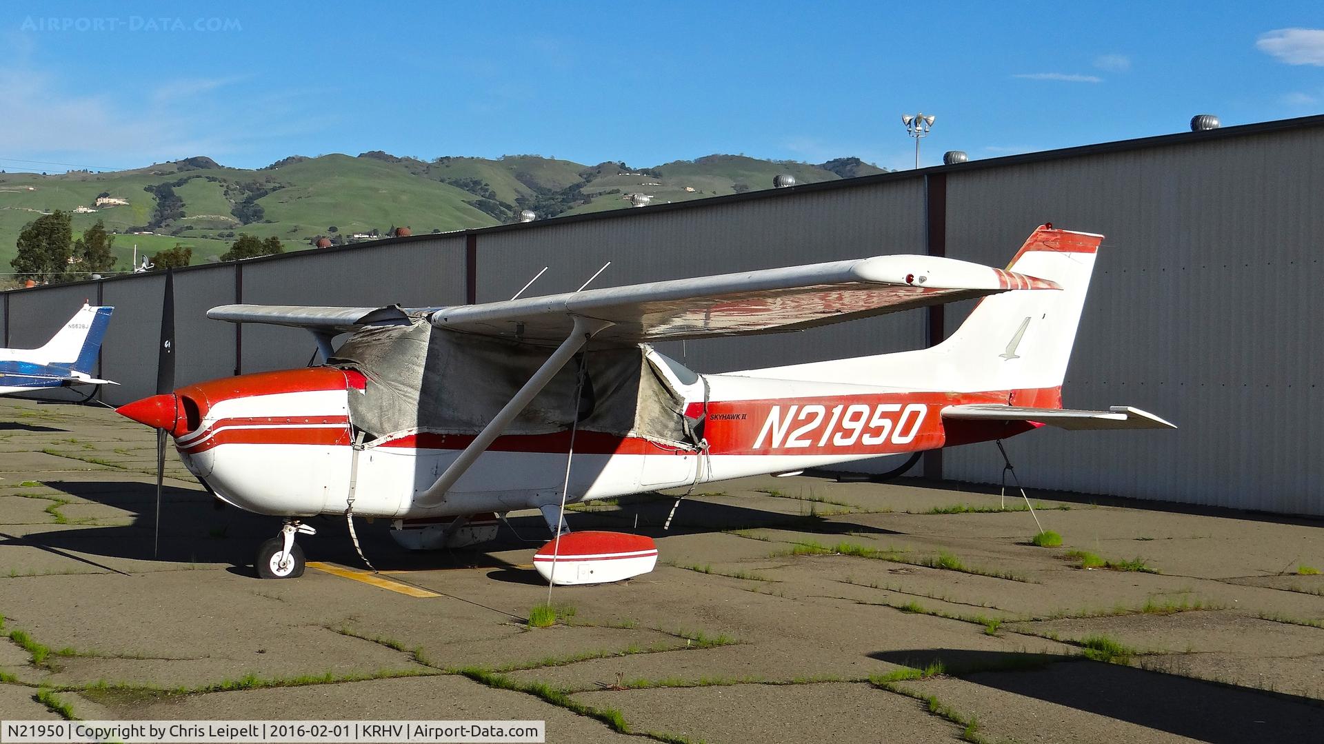 N21950, 1975 Cessna 172M C/N 17264046, Poor old locally-based 1975 Cessna 172M parked at its usual tie down parked at a temporary tie down to make room for all the transient Super Bowl 50 aircraft coming to Reid Hillview Airport, San Jose, CA.