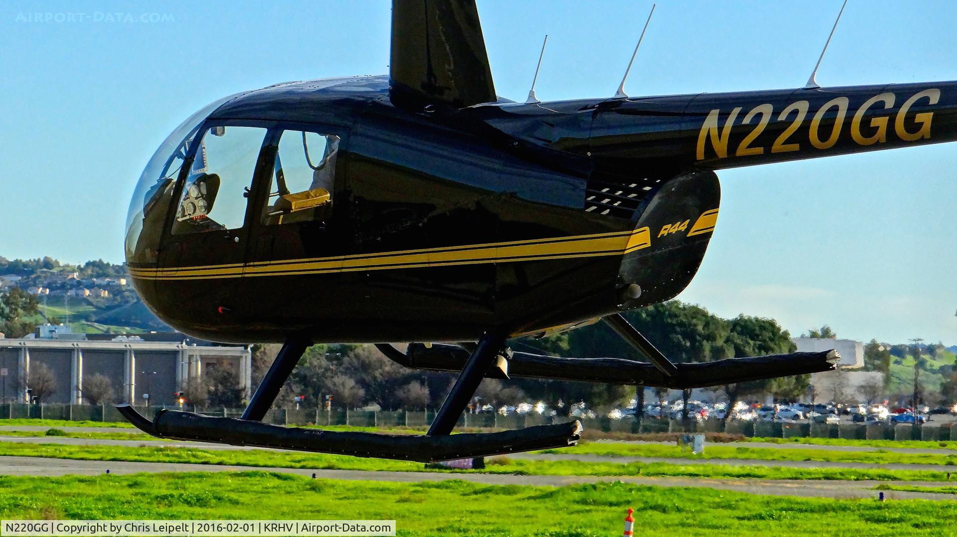 N220GG, 2009 Robinson R44 II C/N 12820, Locally-based 2009 Robinson R44 II taxing by me back to its hangar at Reid Hillview Airport, San Jose, CA.
