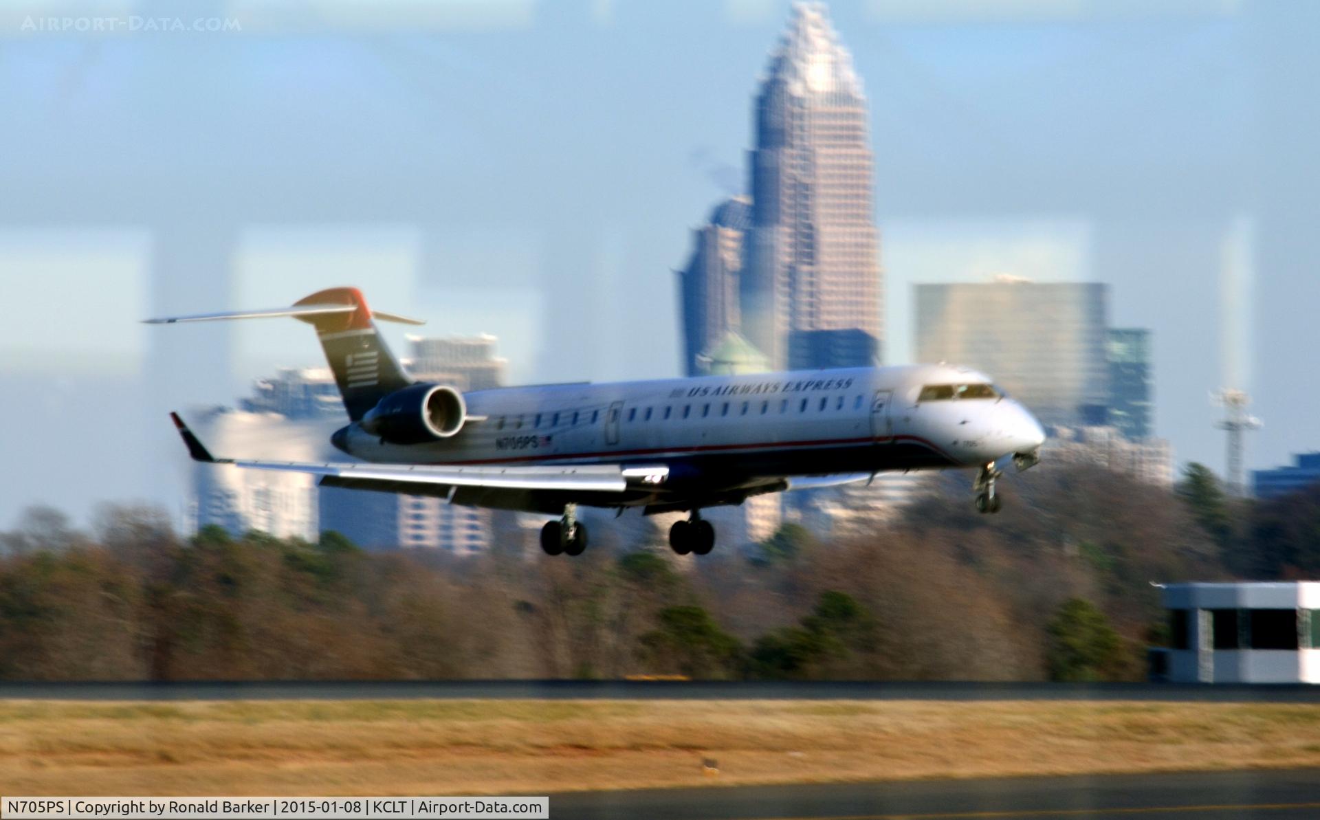 N705PS, 2004 Bombardier CRJ-701 (CL-600-2C10) Regional Jet C/N 10144, Landing CLT
