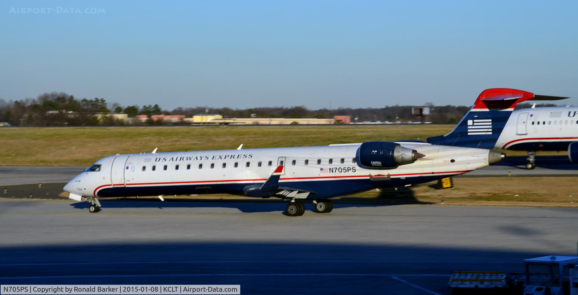 N705PS, 2004 Bombardier CRJ-701 (CL-600-2C10) Regional Jet C/N 10144, Taxi to park CLT