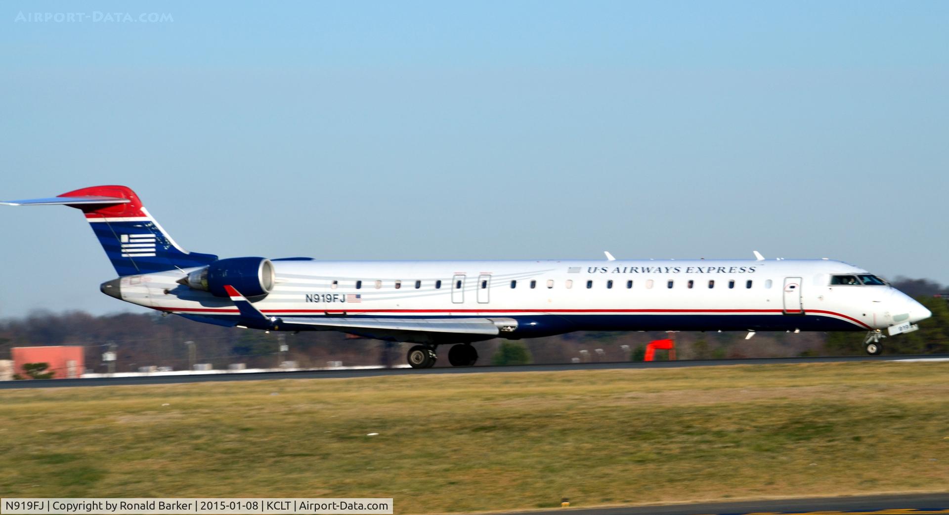 N919FJ, 2004 Bombardier CRJ-900ER (CL-600-2D24) C/N 15019, Takeoff CLT