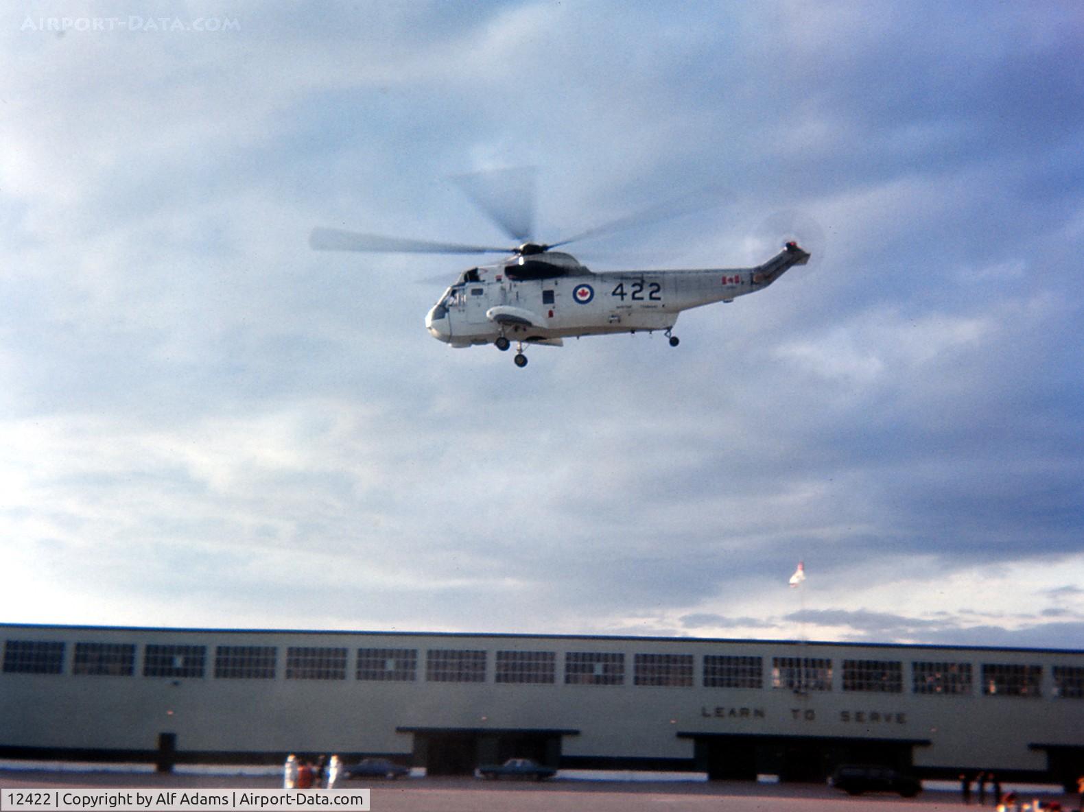 12422, Sikorsky CH-124A Sea King C/N 61-288, Shown hovering over the parade square at Canadian Forces Base Cornwallis, Nova Scotia, Canada in 1971.