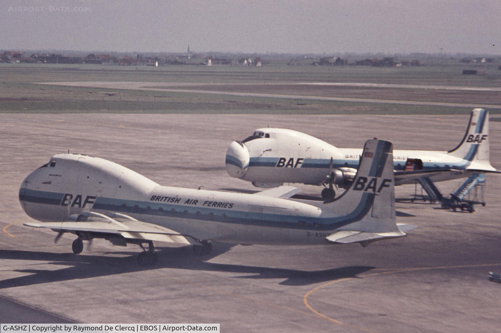 G-ASHZ, 1944 Aviation Traders ATL-98 Carvair (C-54B) C/N 27249, G-ASHZ is leaving the apron while G-AOFW is waiting for loading at Ostend in early 1970's.