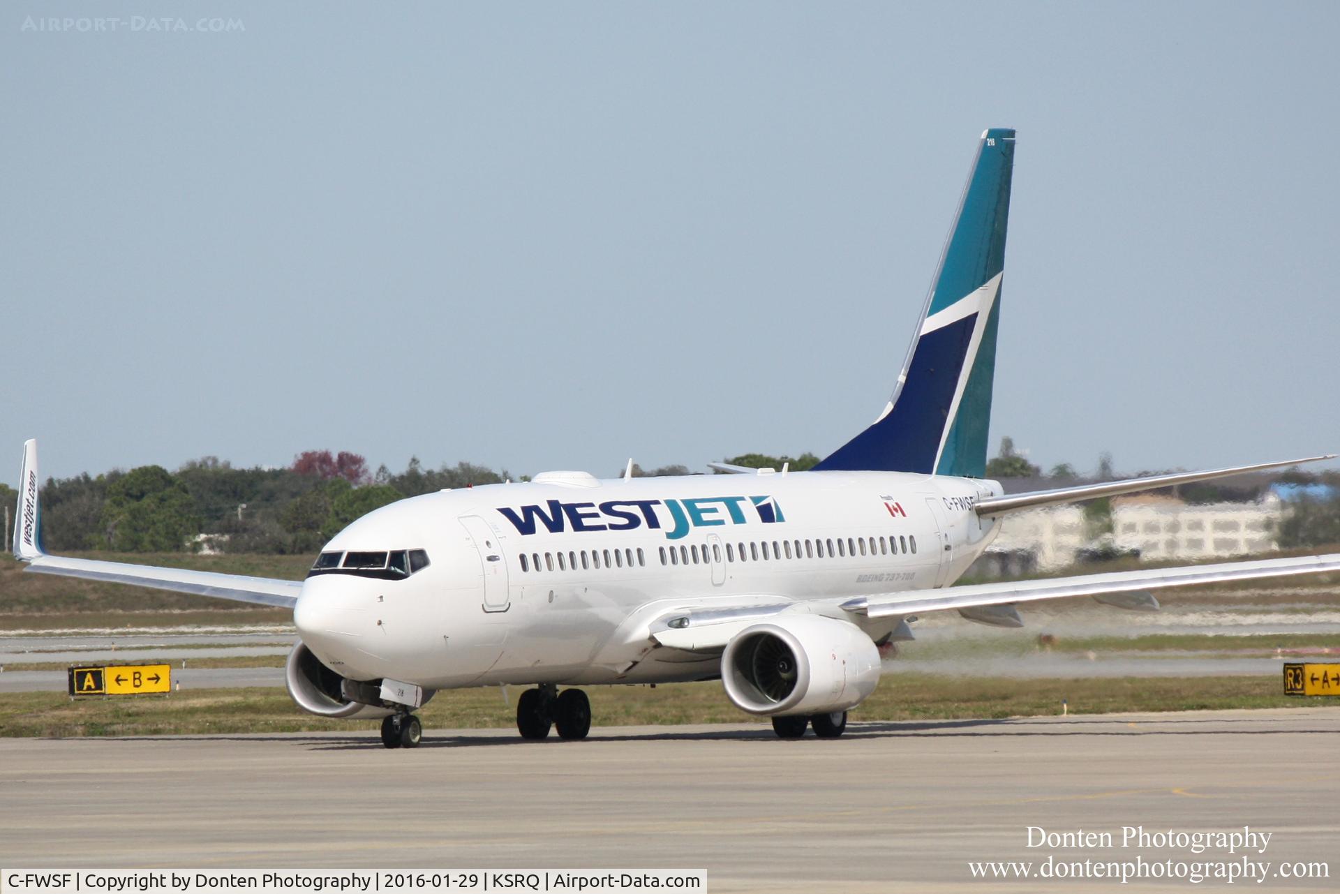 C-FWSF, 2003 Boeing 737-7CT C/N 32758, WestJet Flight 1187 (C-FWSF)  prepares for flight at Sarasota-Bradenton International Airport