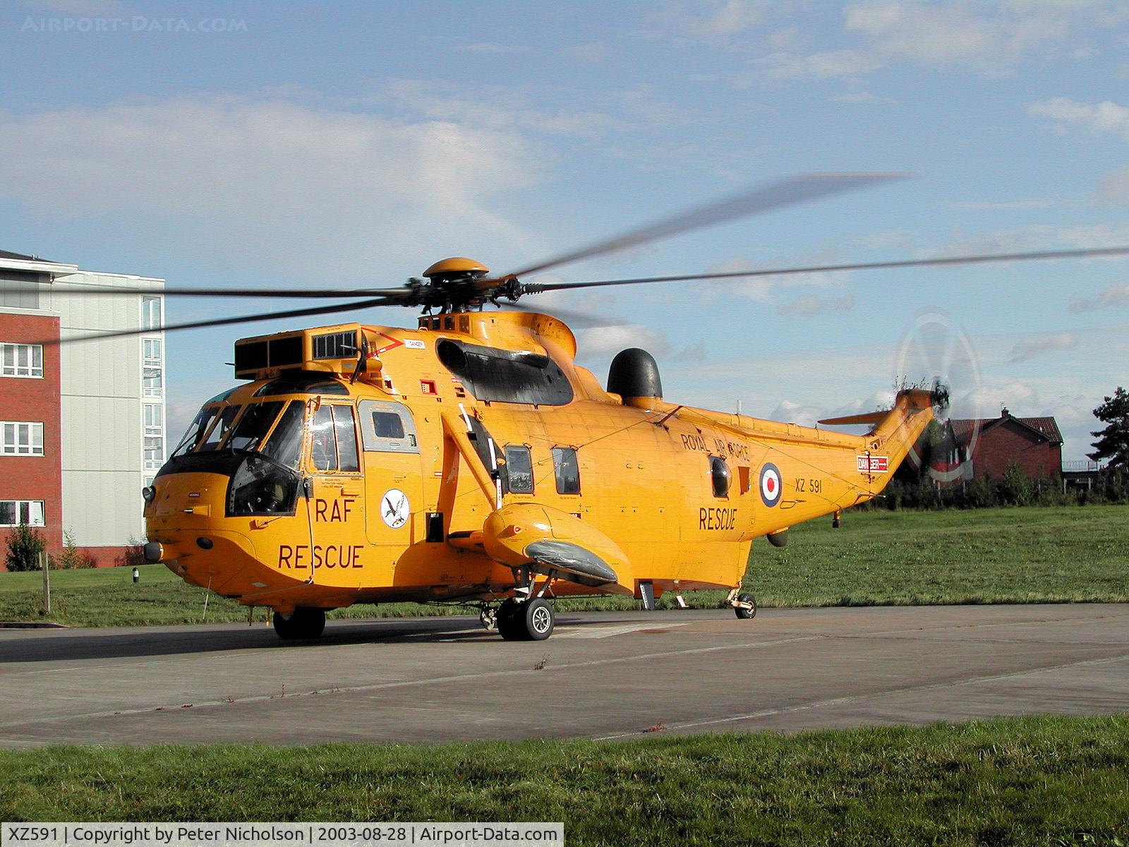 XZ591, 1978 Westland Sea King HAR.3 C/N WA857, Sea King HAR.3, callsign Rescue 131, of 202 Squadron at RAF Boulmer on a visit to the Cumberland Infirmary in the Summer of 2003.