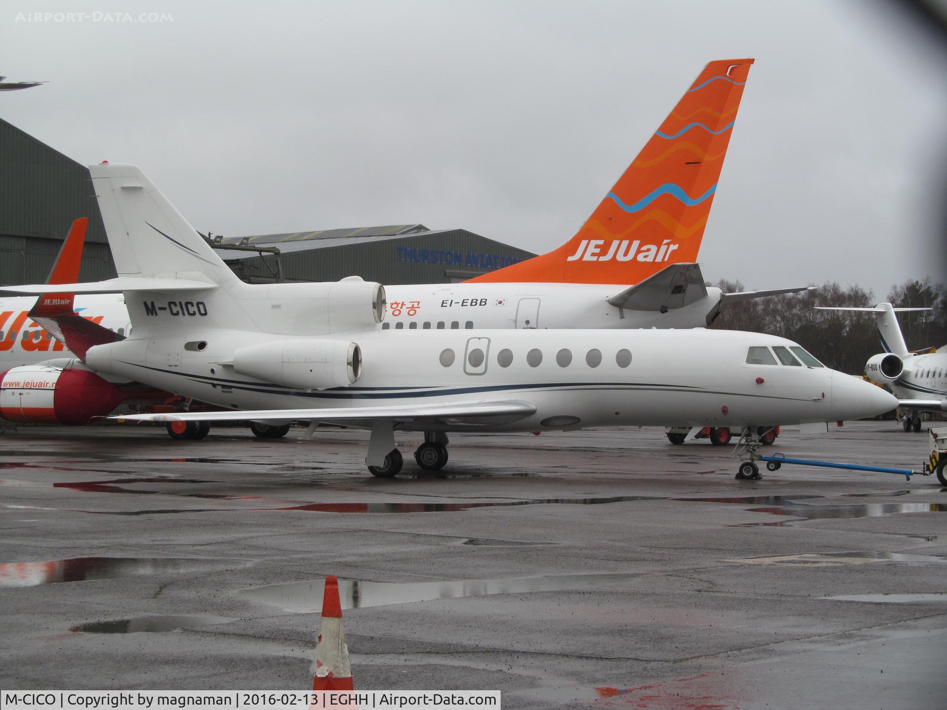 M-CICO, 2005 Dassault Falcon 50EX C/N 345, At hurn preventing a decent shot of newly painted Jeju Air!