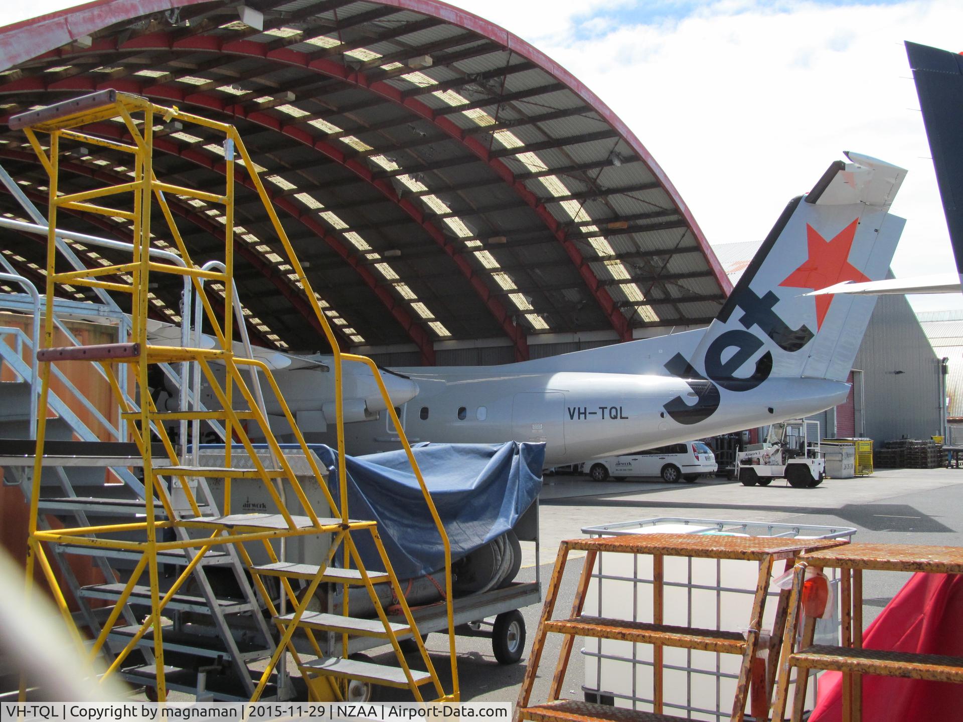 VH-TQL, 2004 De Havilland Canada DHC-8-315Q Dash 8 C/N 603, hiding in hangar prior to entry into NZ service