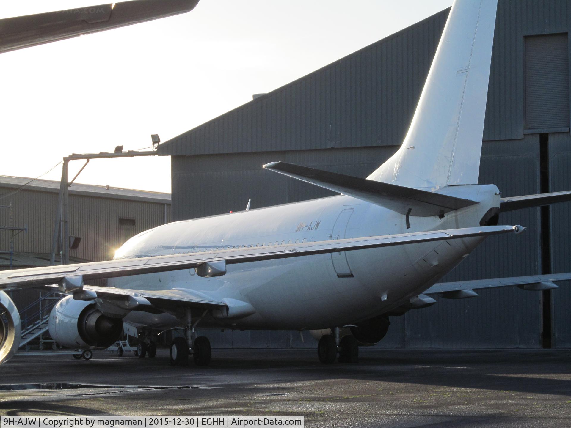 9H-AJW, 1998 Boeing 737-3U3 C/N 28733, on ramp at hurn with many other 737s