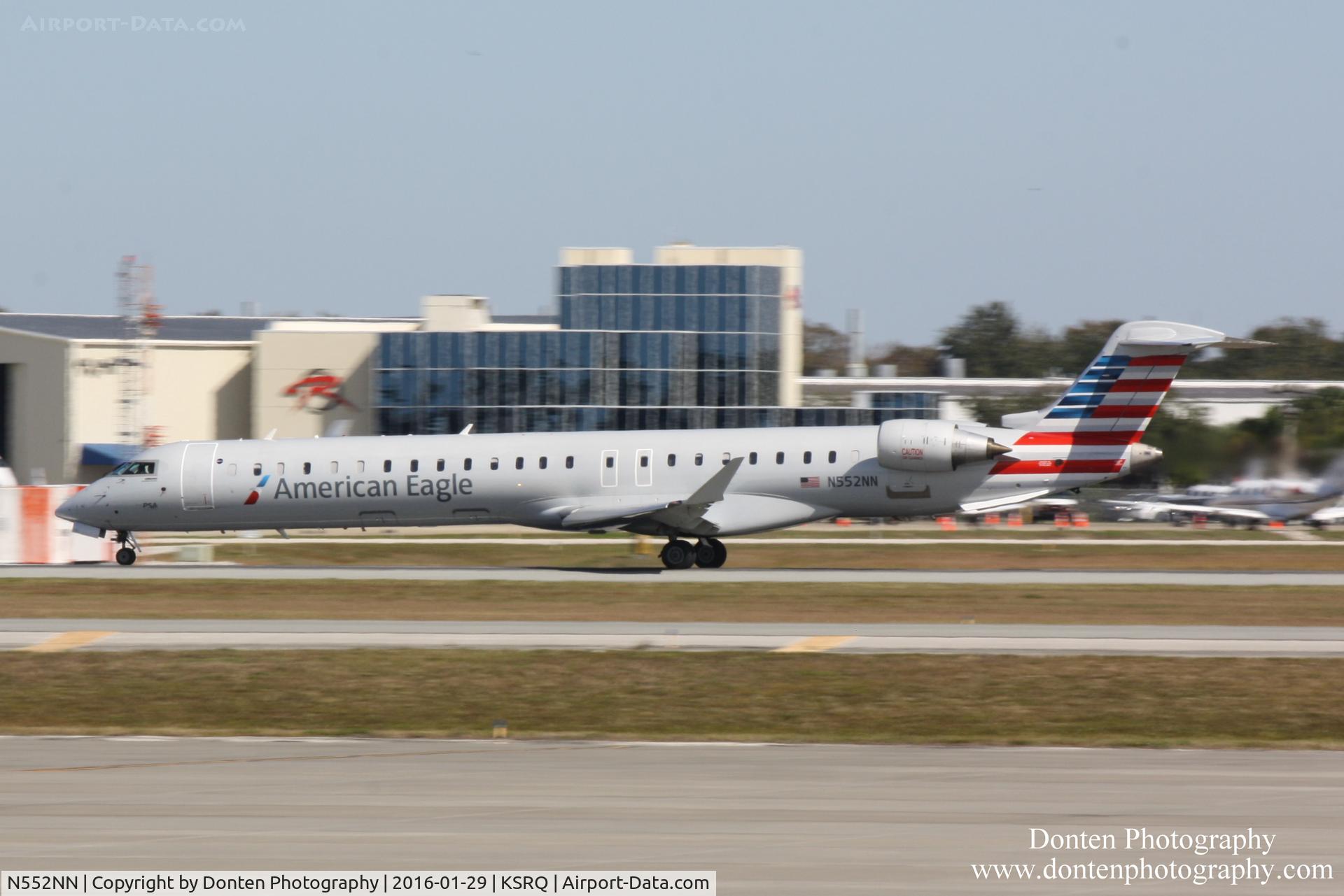 N552NN, 2014 Bombardier CRJ-900 (CL-600-2D24) C/N 15328, American Flight 5403 operated by PSA (N552NN) arrives at Sarasota-Bradenton International Airport following flight from Charlotte-Douglas International Airport