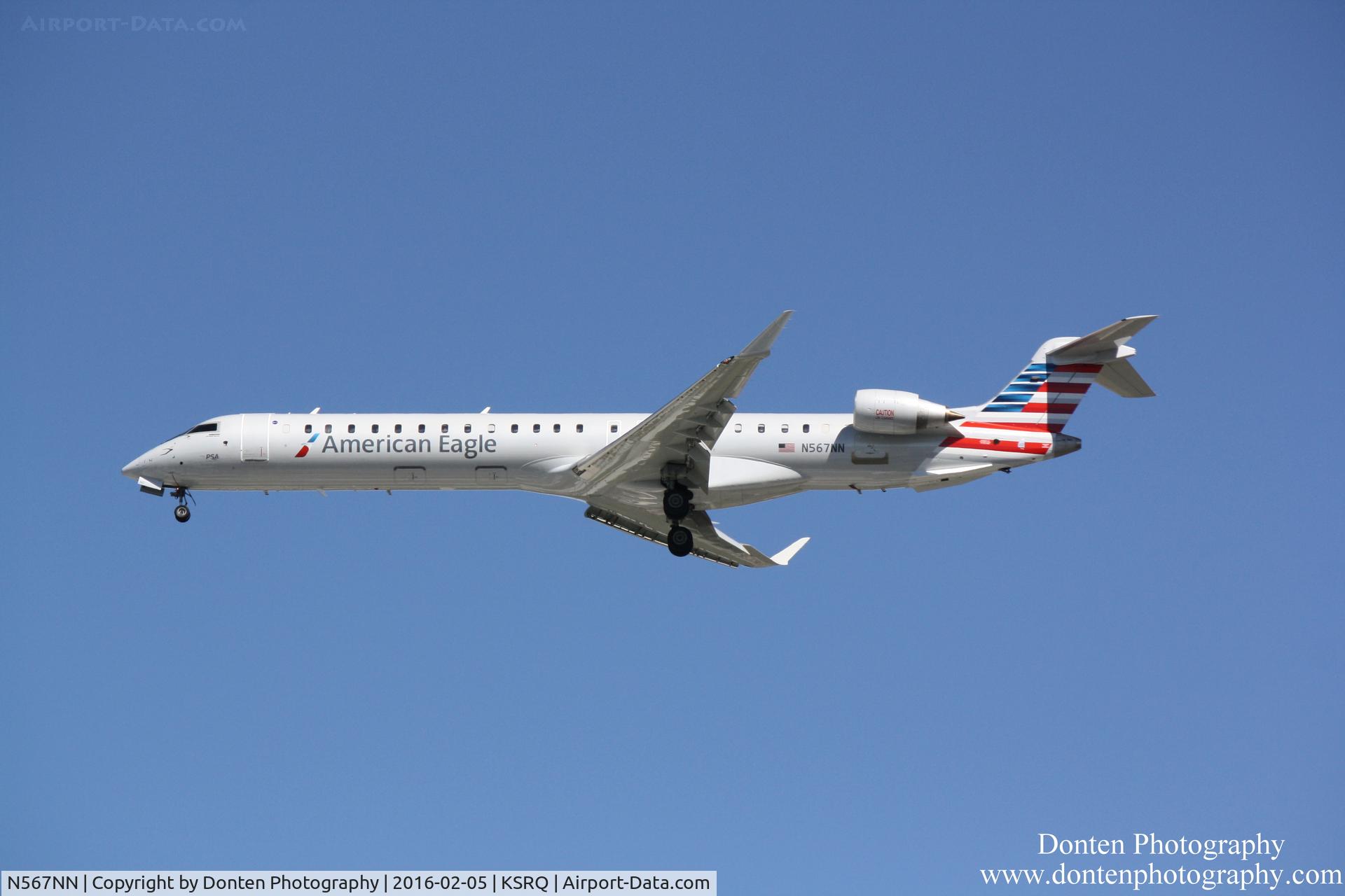 N567NN, 2015 Bombardier CRJ-900 (CL-600-2D24) C/N 15354, American Flight 5403 operated by PSA (N567NN) arrives at Sarasota-Bradenton International Airport following flight from Charlotte-Douglas International Airport