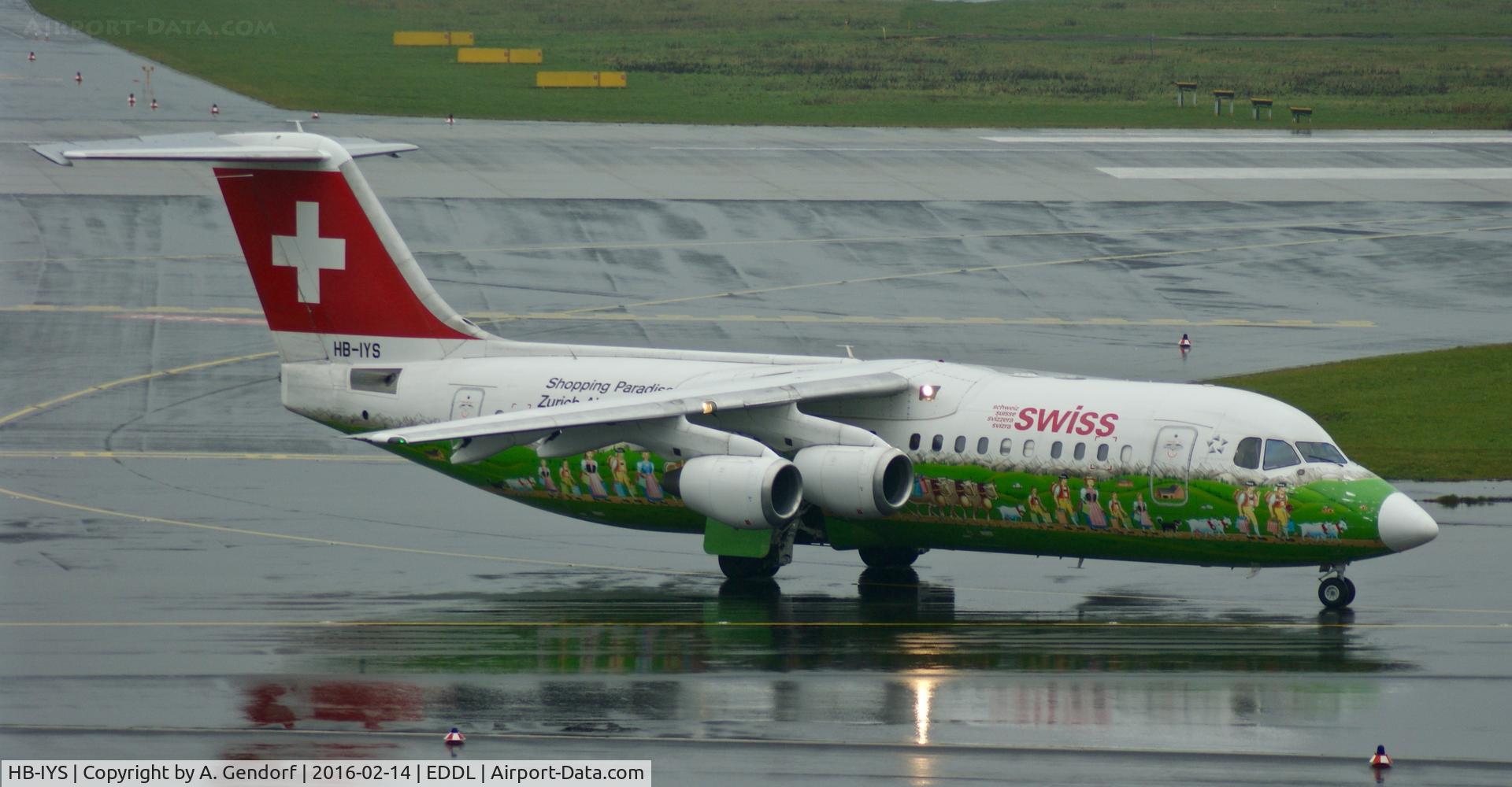 HB-IYS, 2001 British Aerospace Avro 146-RJ100 C/N E3381, Swiss (Shopping Paradise - Zürich Airport cs.), is here taxiing shortly after landing at Düsseldorf Int'l(EDDL)