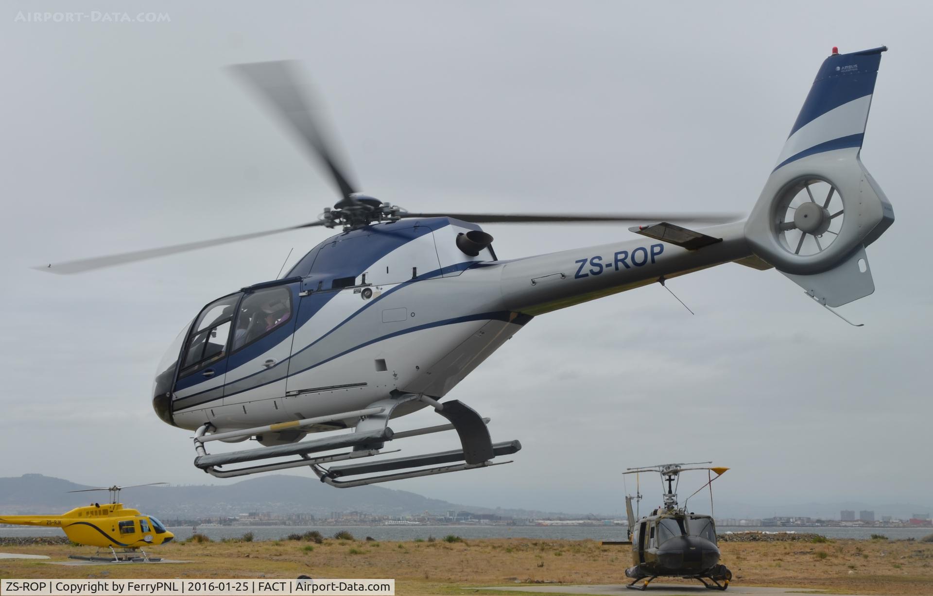 ZS-ROP, 2002 Eurocopter EC-120B Colibri C/N 1332, EC120 Lifting-off for a 15 minute flight from V&A Waterfront Heliport