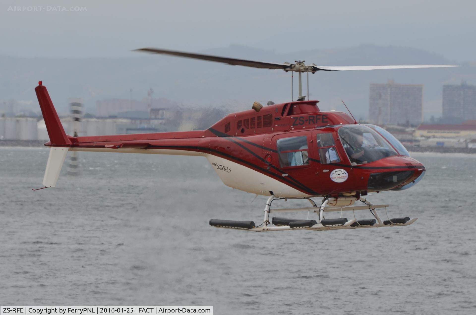 ZS-RFE, 1984 Bell 206B C/N 3809, Bell 206 returning from a sight seeing flight at V&A Waterfront Heliport