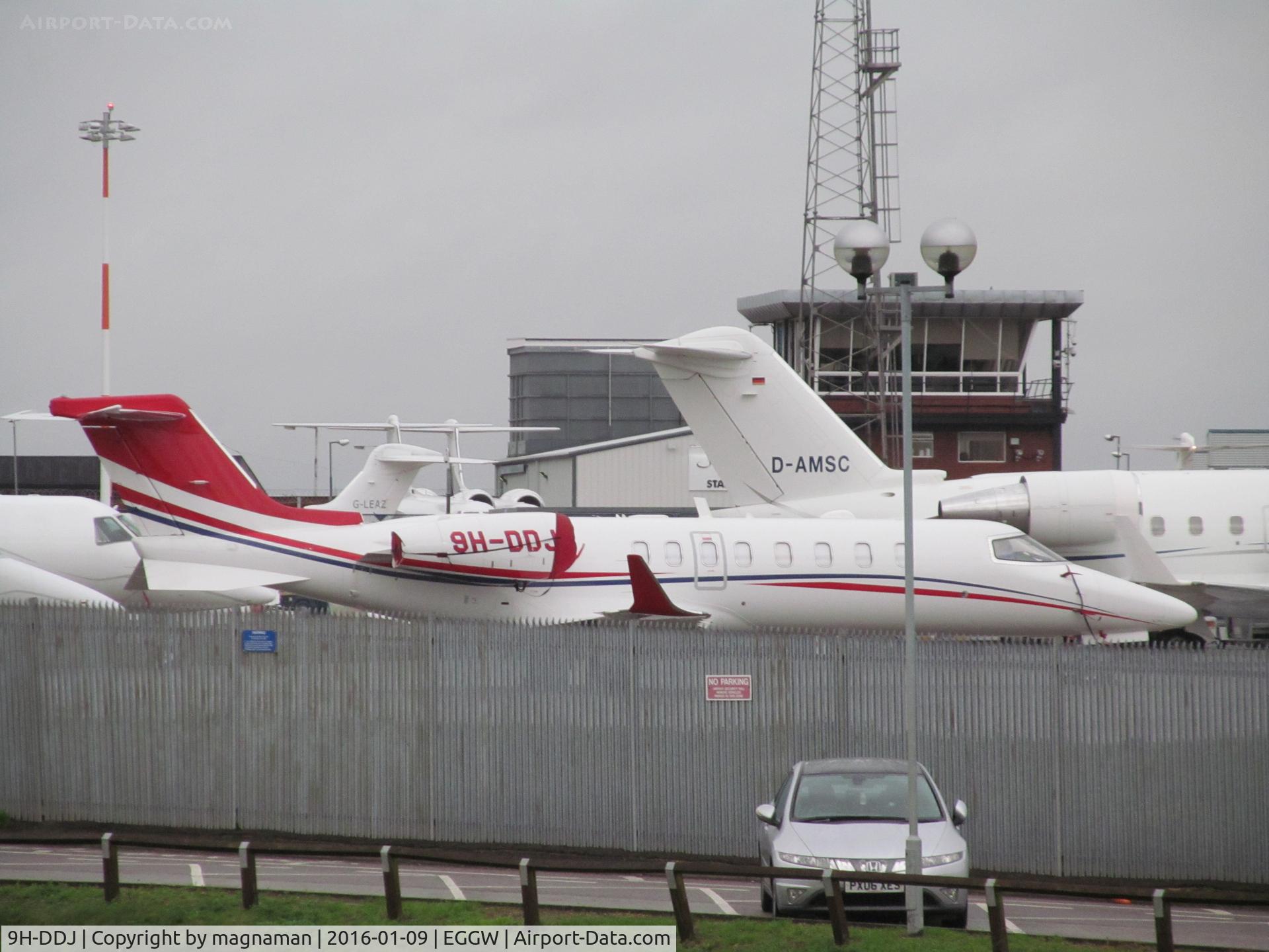9H-DDJ, 2014 Learjet 75 C/N 45-494, on wet luton apron