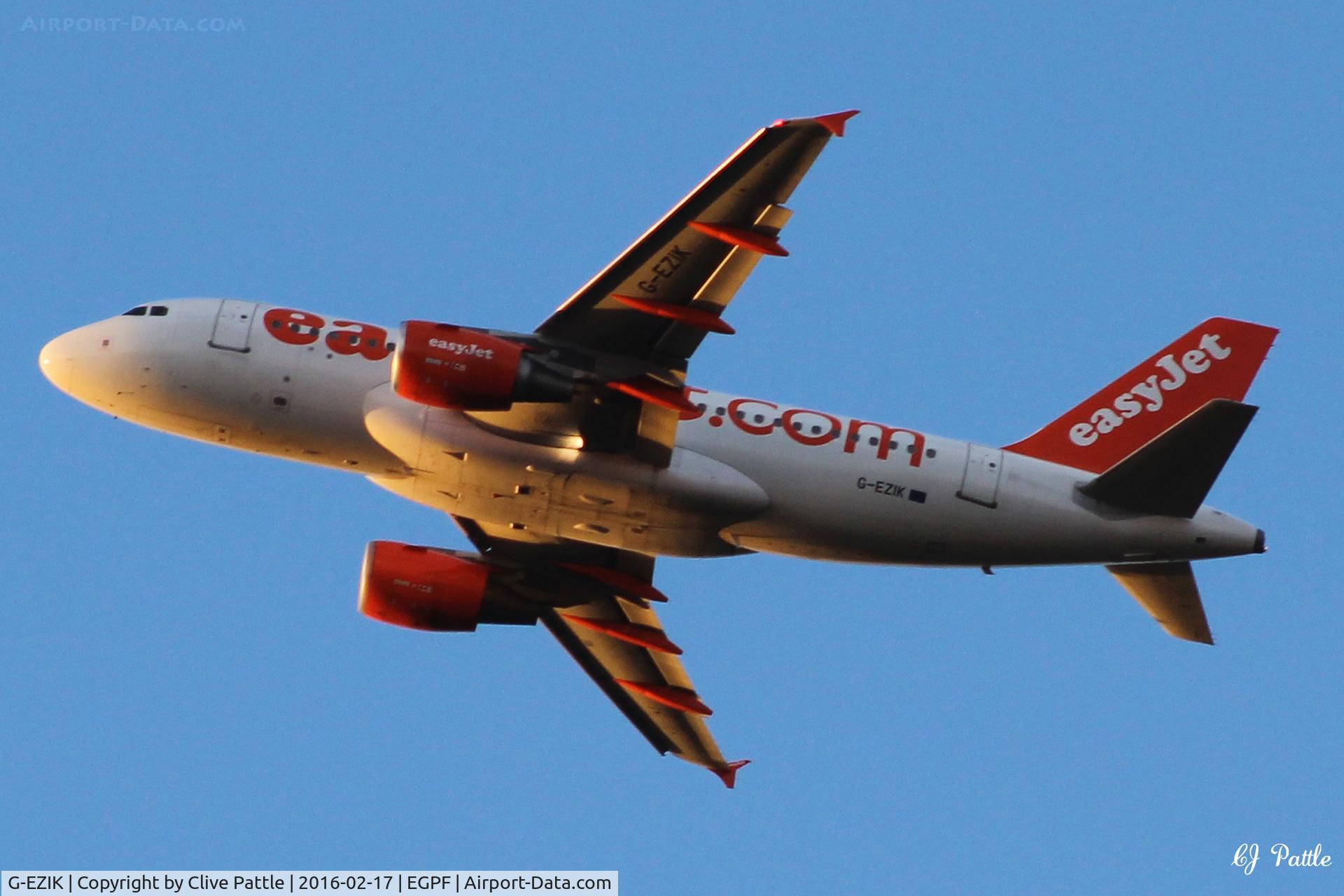 G-EZIK, 2005 Airbus A319-111 C/N 2481, Sunset departure from Glasgow EGPF
