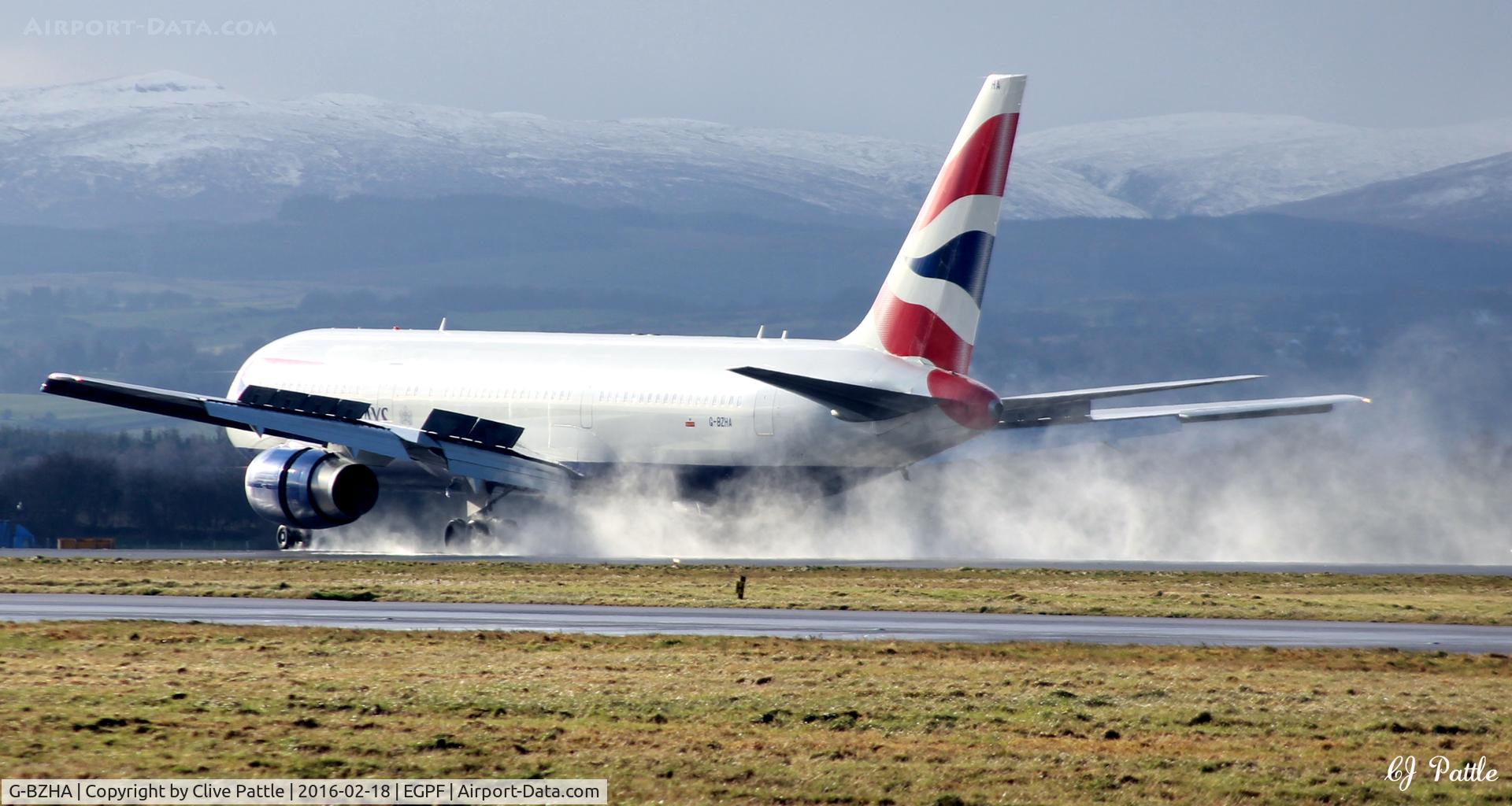 G-BZHA, 1998 Boeing 767-336 C/N 29230, Spray action at Glasgow International EGPF