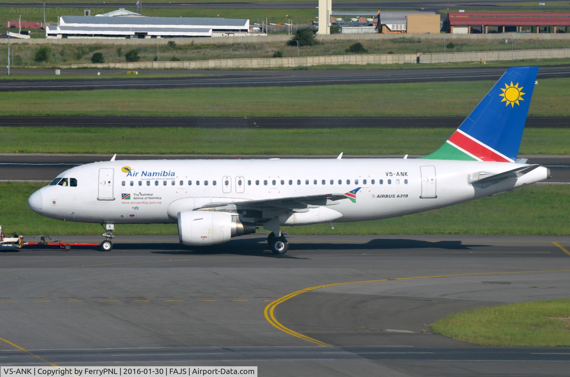 V5-ANK, 2008 Airbus A319-112 C/N 3586, Air Namibia A319 towed to its gate after some tlc at SAA mainanance facility.