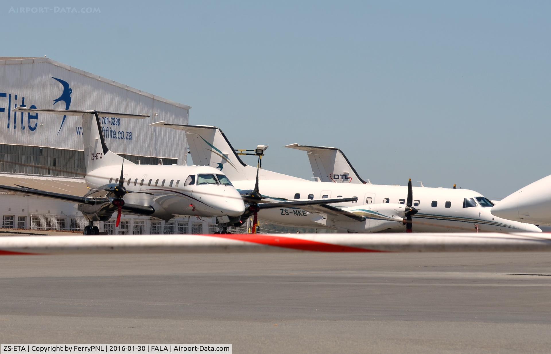 ZS-ETA, 1992 Embraer EMB-120 Brasilia C/N 120277, EMB120 parked at Lanseria for the weekend.