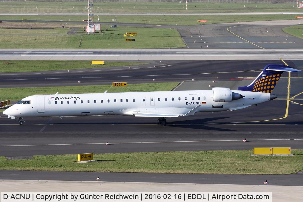 D-ACNU, 2011 Bombardier CRJ-900 NG (CL-600-2D24) C/N 15265, Taxiing to the runway