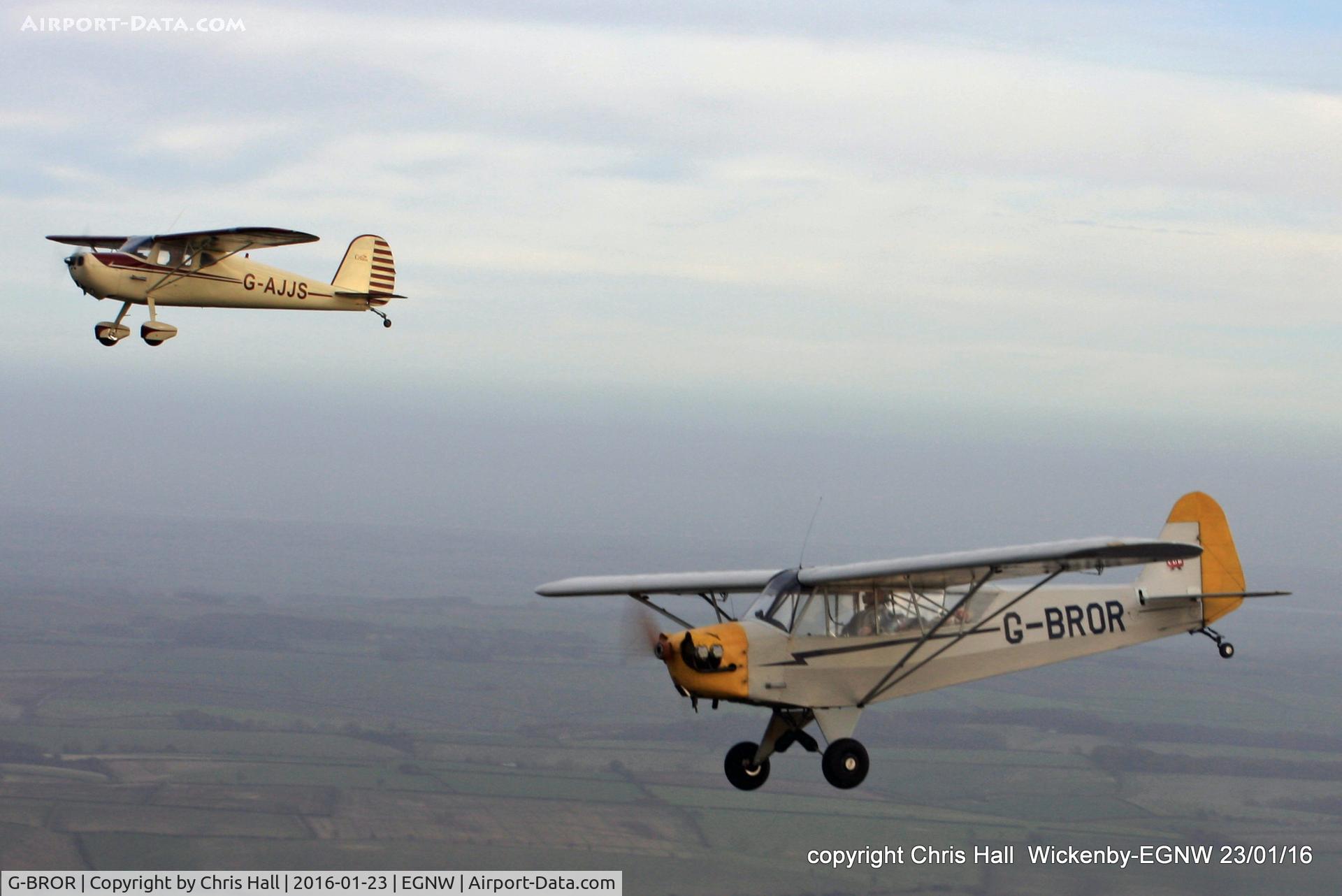 G-BROR, 1943 Piper L-4H Grasshopper (J3C-65D) C/N 10885, in formation with G-AJJS over Wickenby