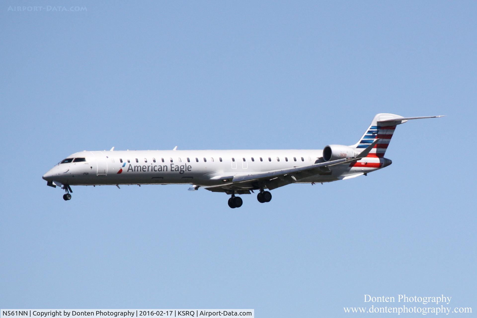 N561NN, 2014 Bombardier CRJ-900 (CL-600-2D24) C/N 15346, American Flight 5403 operated by PSA (N561NN) arrives at Sarasota-Bradenton International Airport following flight from Charlotte-Douglas International Airport