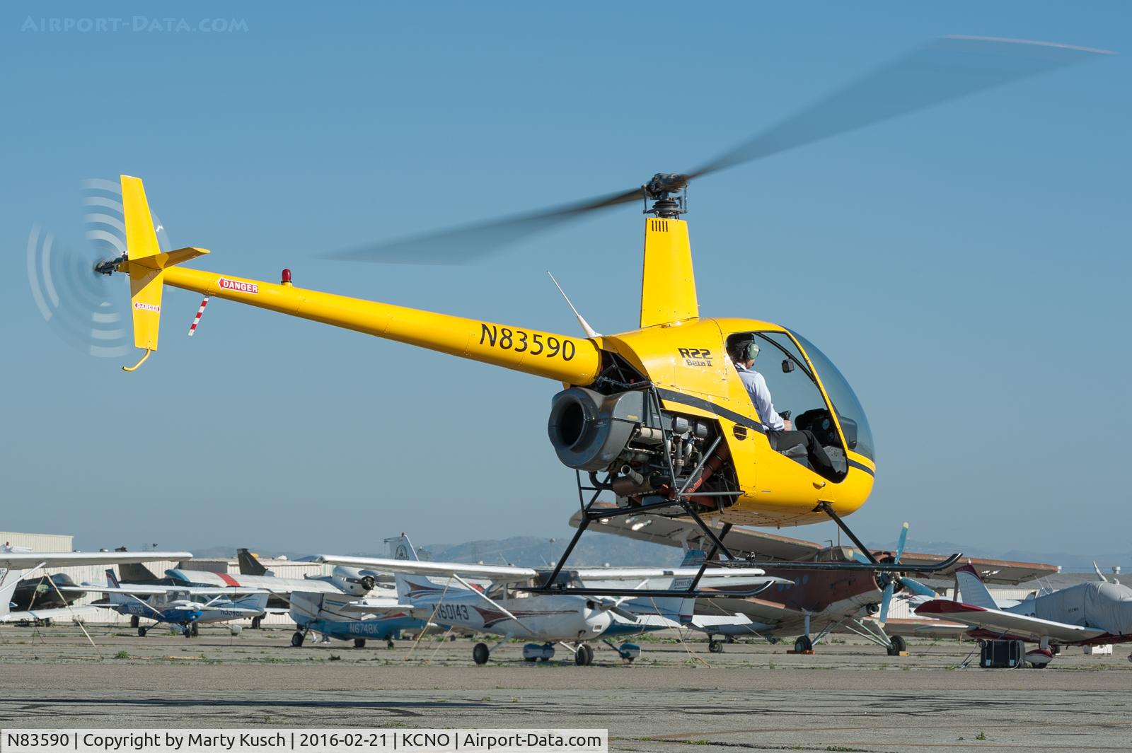 N83590, 2001 Robinson R22 Beta II C/N 3282, M.I. Air Student departing on a training flight.