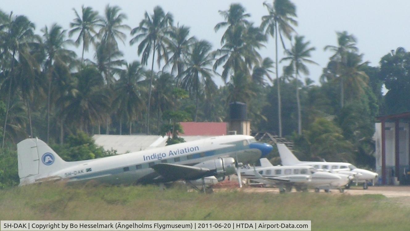 5H-DAK, 1943 Douglas C-47A-30-DL Skytrain (DC3) C/N 9581, Photo trough window from landing plane at Dar es Salaam International Airport on 2011 06 20.