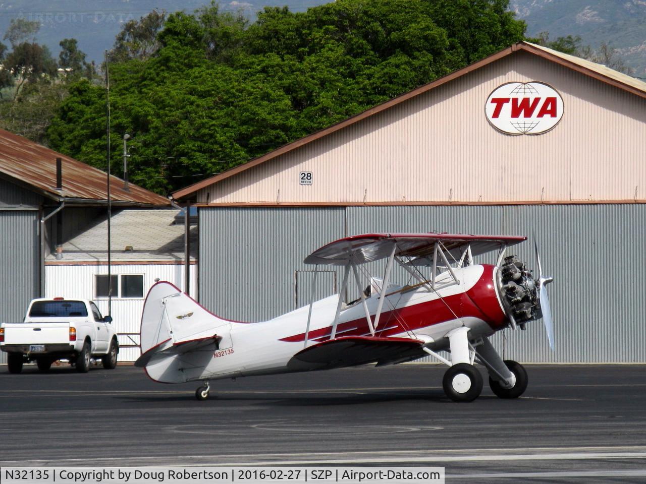 N32135, 1941 Waco UPF-7 C/N 5767, 1941 Waco UPF-7, Continental W670 220 Hp radial, a stunning showplane with chromed prop & spinner, holding short Rwy 22