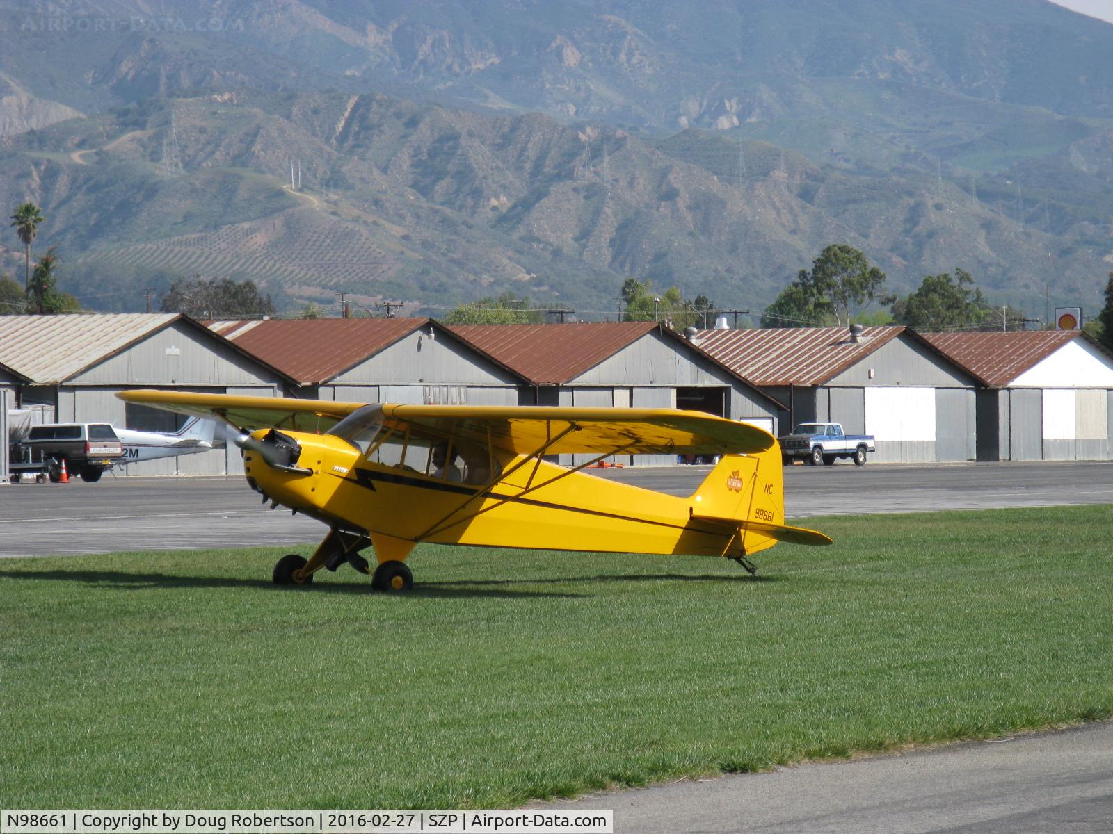 N98661, 1946 Piper J3C-65 Cub Cub C/N 18890, 1946 Piper J3C-65 CUB, Continental C75 75 hp upgrade, landing roll Rwy 22L grass