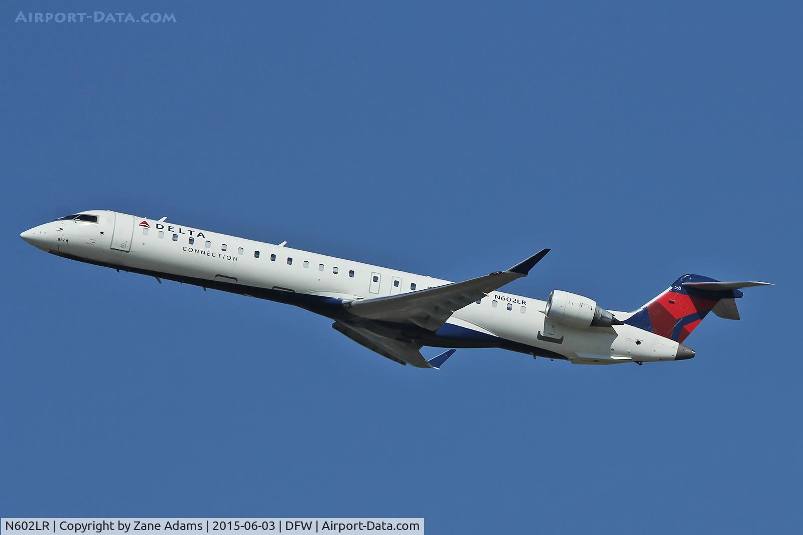 N602LR, 2008 Bombardier CRJ-900ER (CL-600-2D24) C/N 15151, Departing DFW Airport.