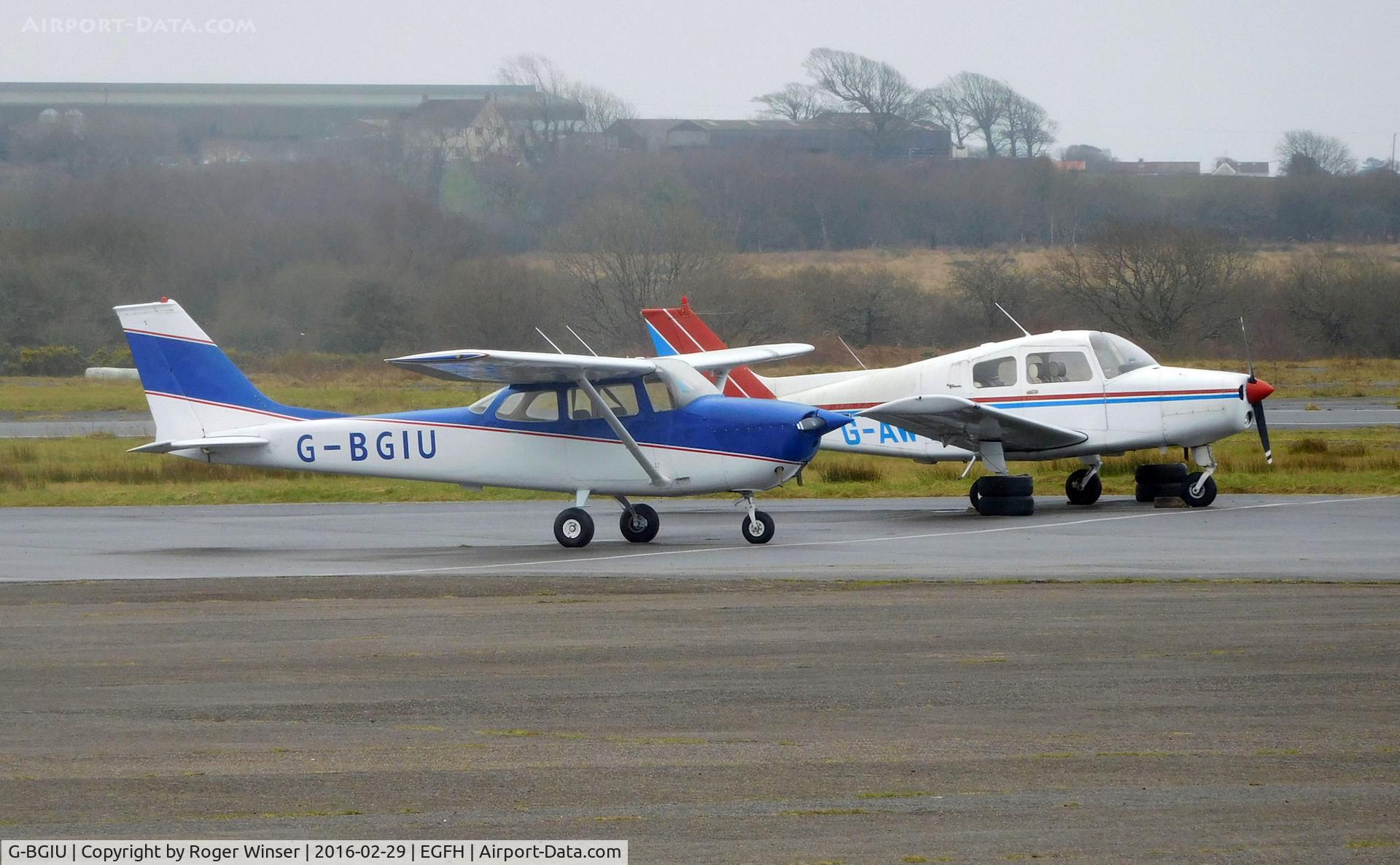 G-BGIU, 1969 Reims F172H Skyhawk C/N 0620, Visiting Reims/Cessna F172H with resident Beech 19A aircraft G-AWTS  in the background.