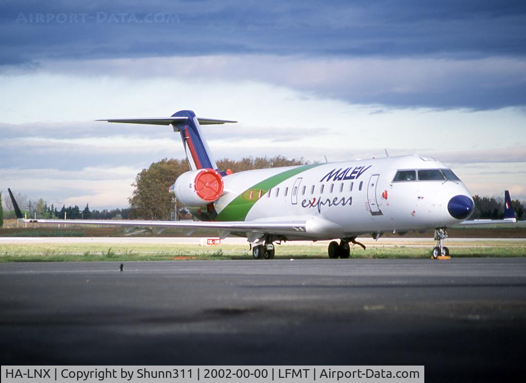 HA-LNX, 1994 Canadair CRJ-100LR (CL-600-2B19) C/N 7032, Parked at the maintenance area...