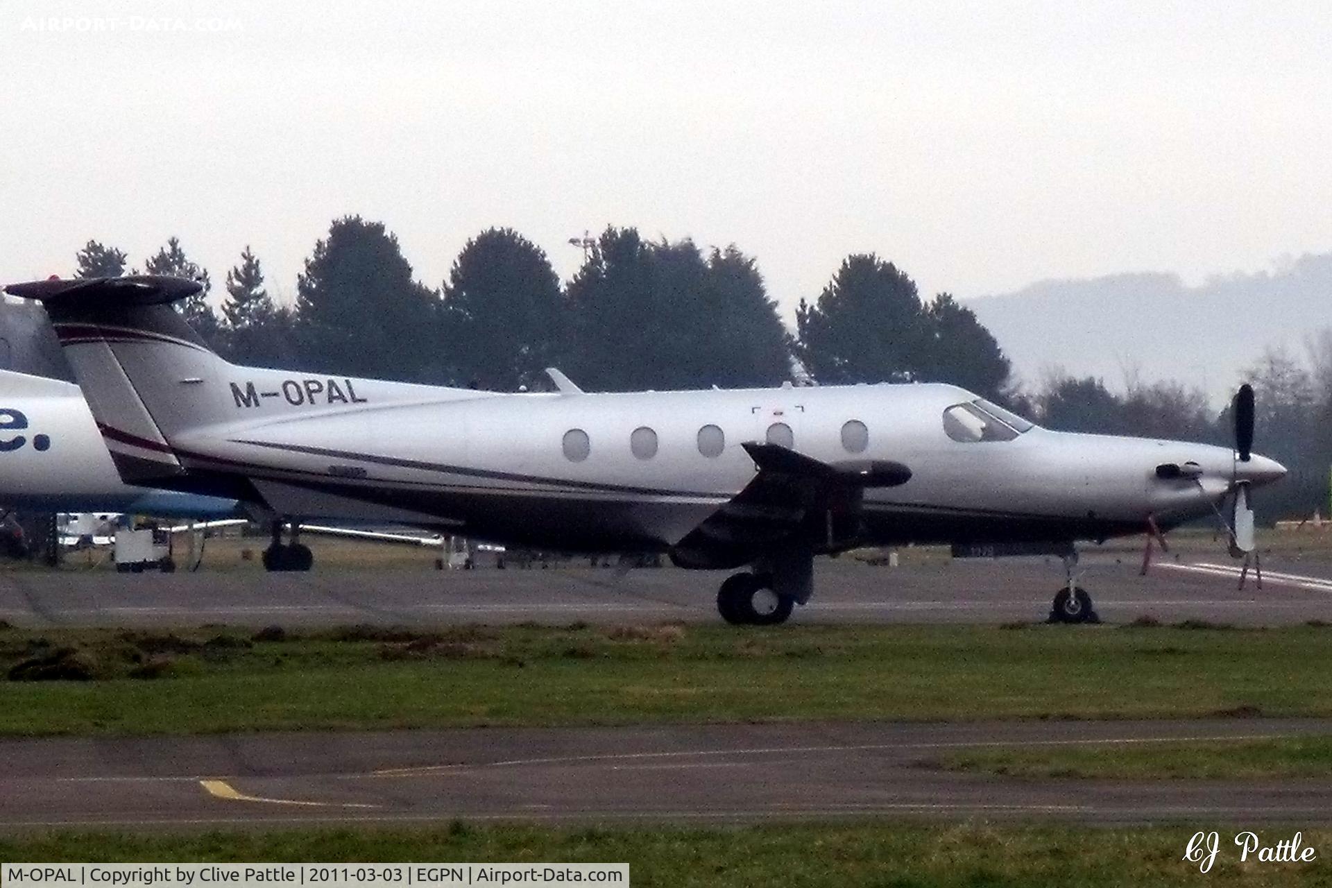 M-OPAL, 2009 Pilatus PC-12/47E C/N 1179, Parked in the mist at Dundee Riverside EGPN