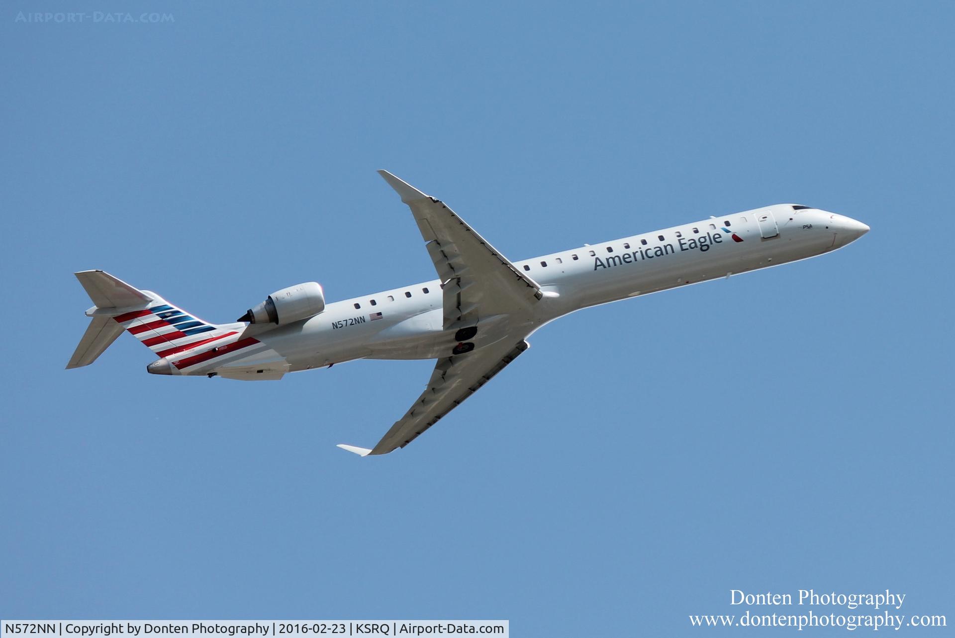 N572NN, 2015 Bombardier CRJ-900 (CL-600-2D24) C/N 15361, American Flight 5139 operated by PSA (N572NN) departs Sarasota-Bradenton International Airport enroute to Charlotte-Douglas International Airport